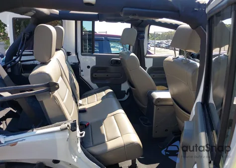 2010 Jeep Wrangler Unlimited Rubicon from USA, damaged, VIN 1J4BA6H17AL230845